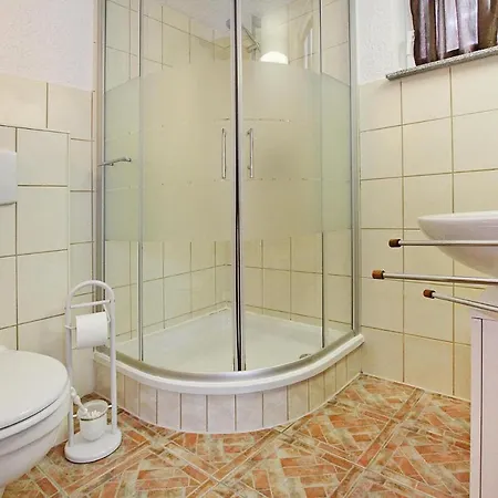 Mit Terrasse Und Kaminofen In *